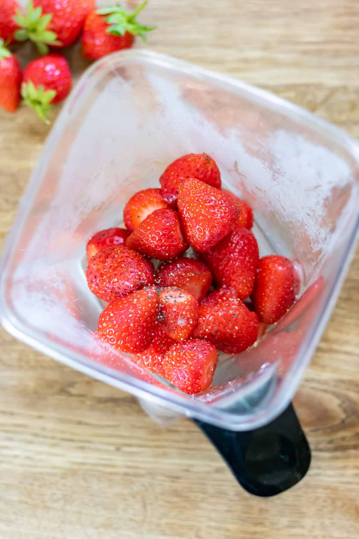 Strawberries in a blender.