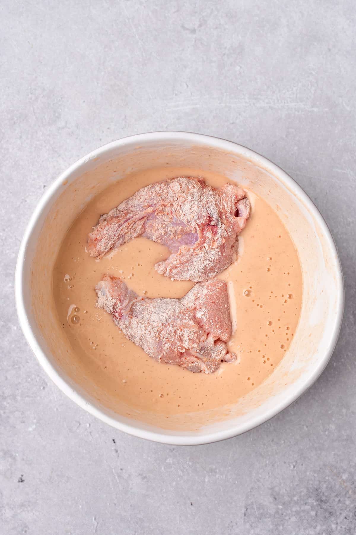 Chicken in buttermilk hot sauce batter.