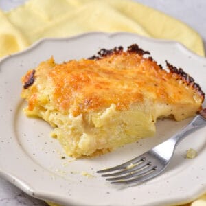 Plate with a serving of au gratin potatoes gruyere.