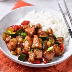 Plate of Kung Pao Chicken over rice.